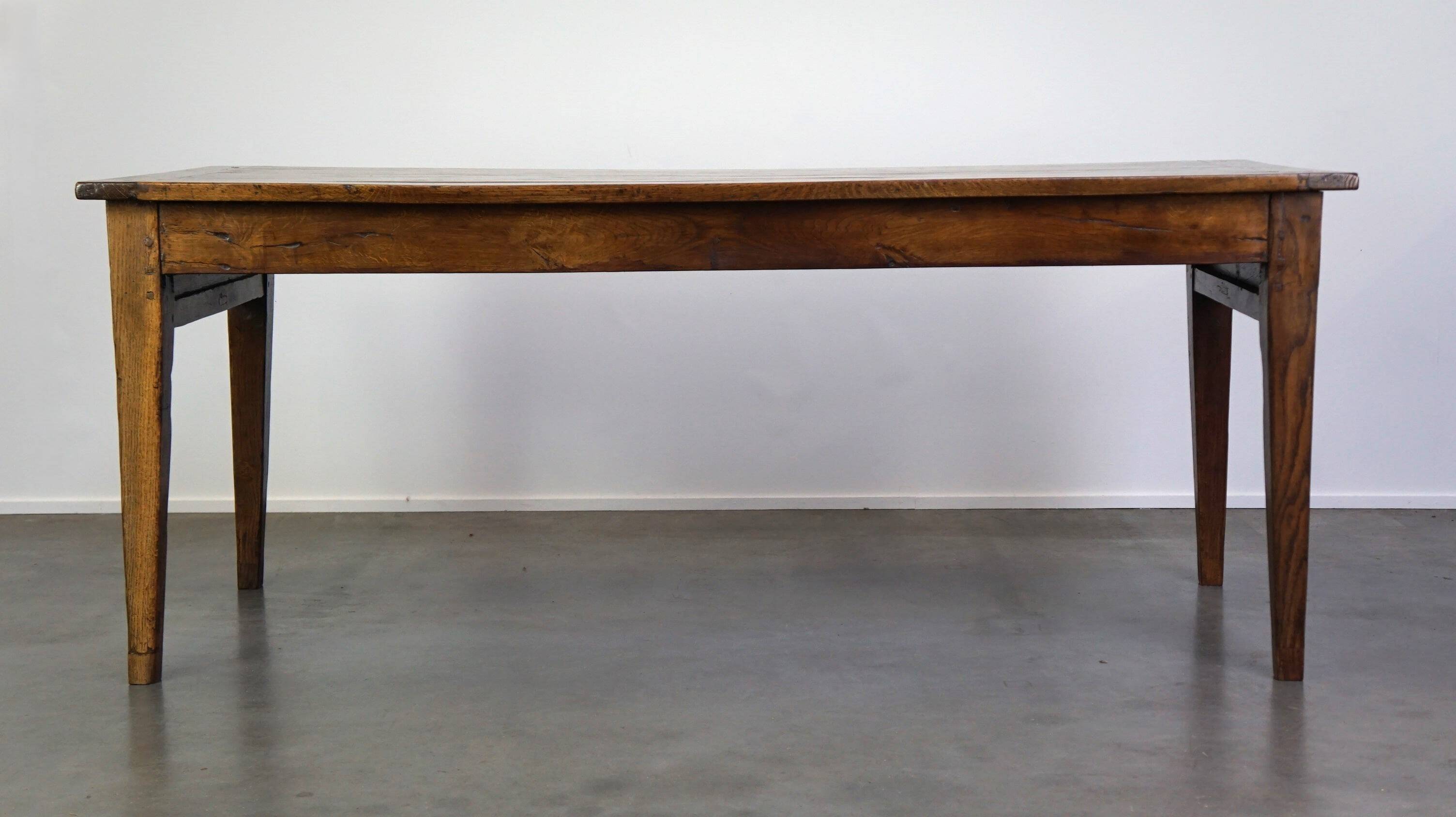 antique French oak dining table with 3 drawers and an exquisite patina