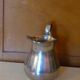 Coffee set in silver metal composed of 3 pitchers, Millan Freres, Paris