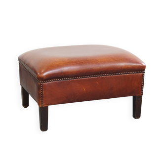 Pouf marron en cuir de vachette