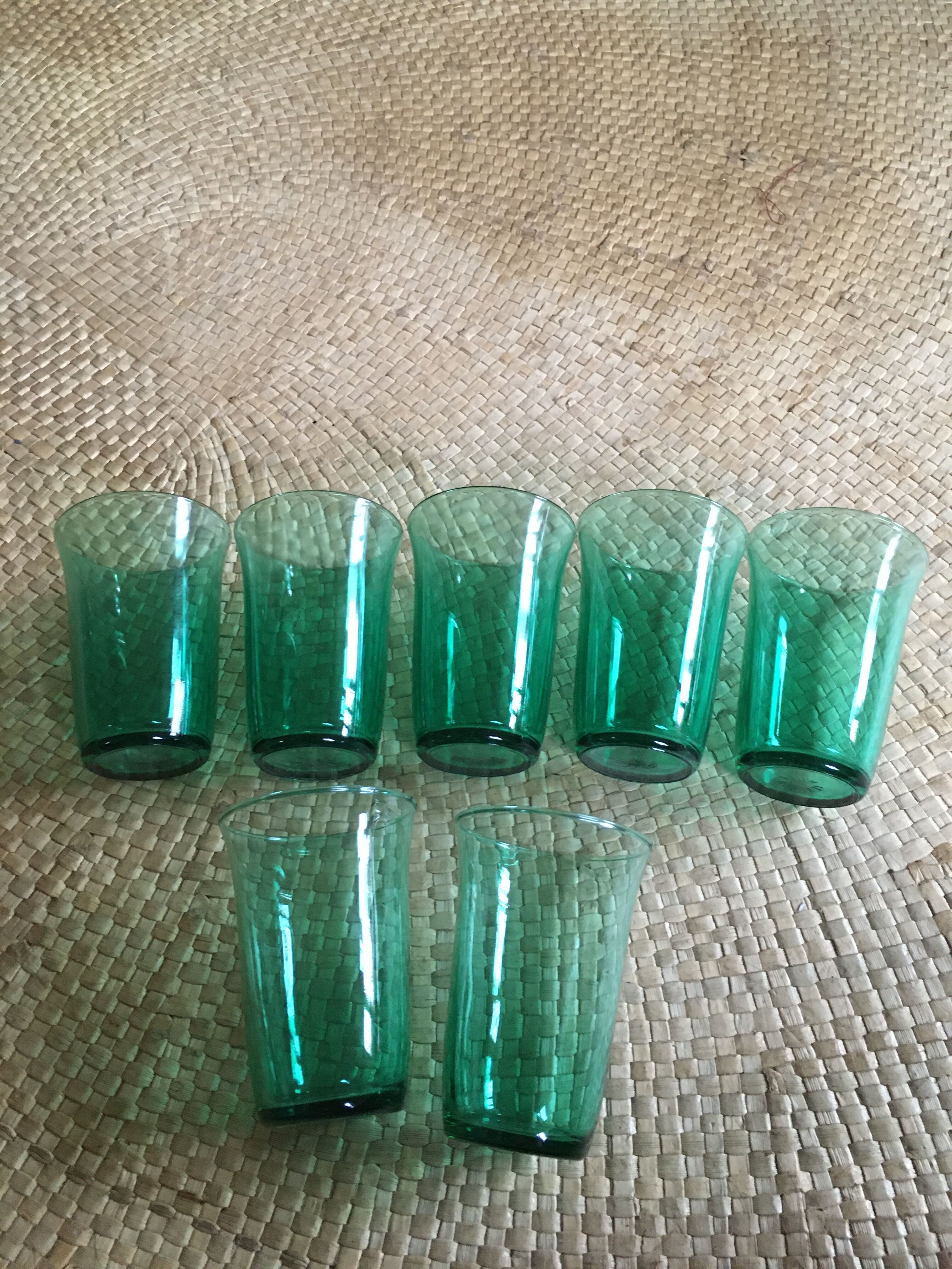 Series of 7 green glasses