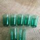 Series of 7 green glasses