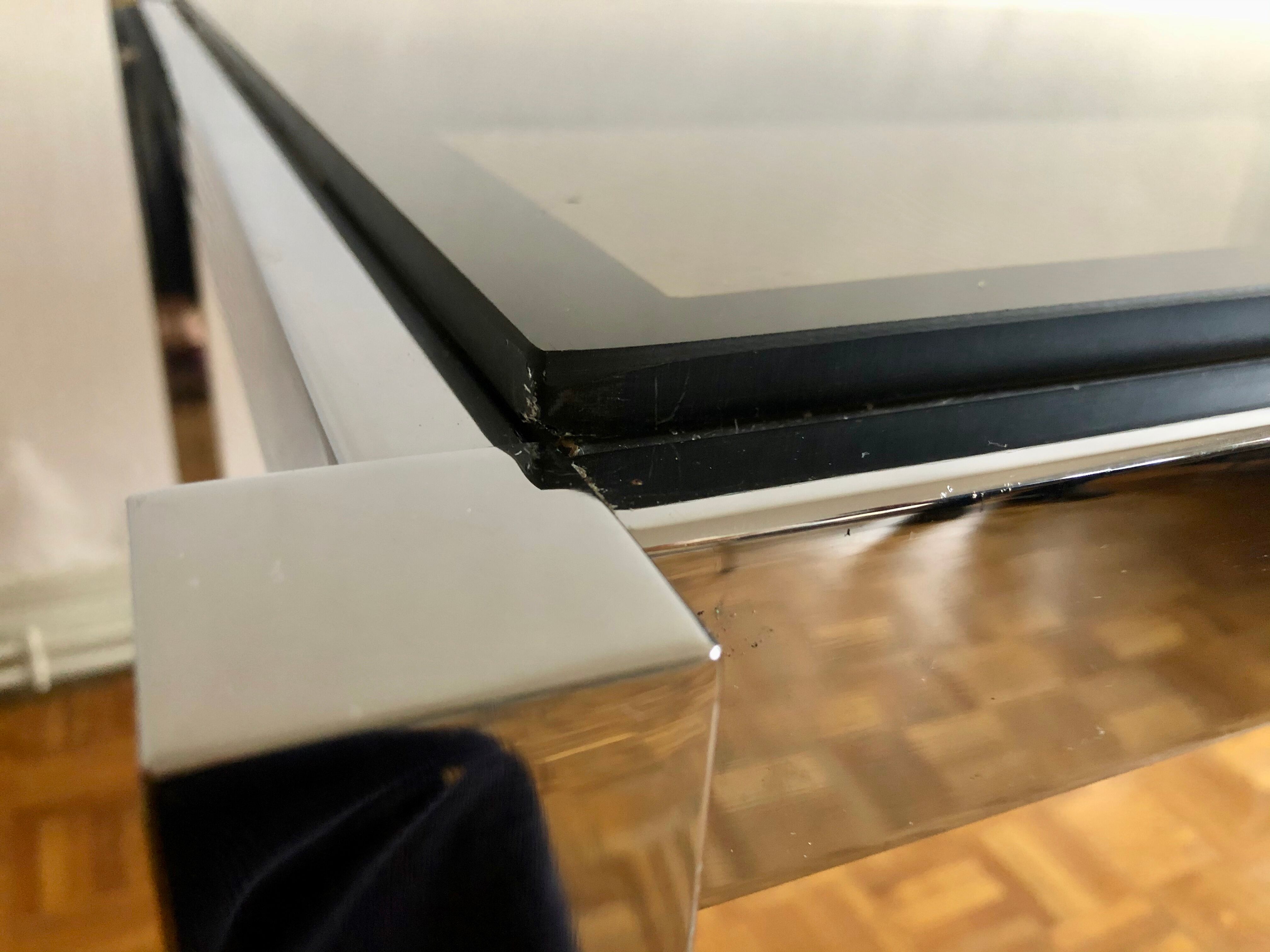 Glass and chrome metal dining table