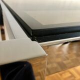 Glass and chrome metal dining table