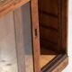 Antique shop counter with glass doors (circa 1920)