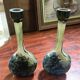 Pair of flower vases in glass paste, with a long slender neck.
