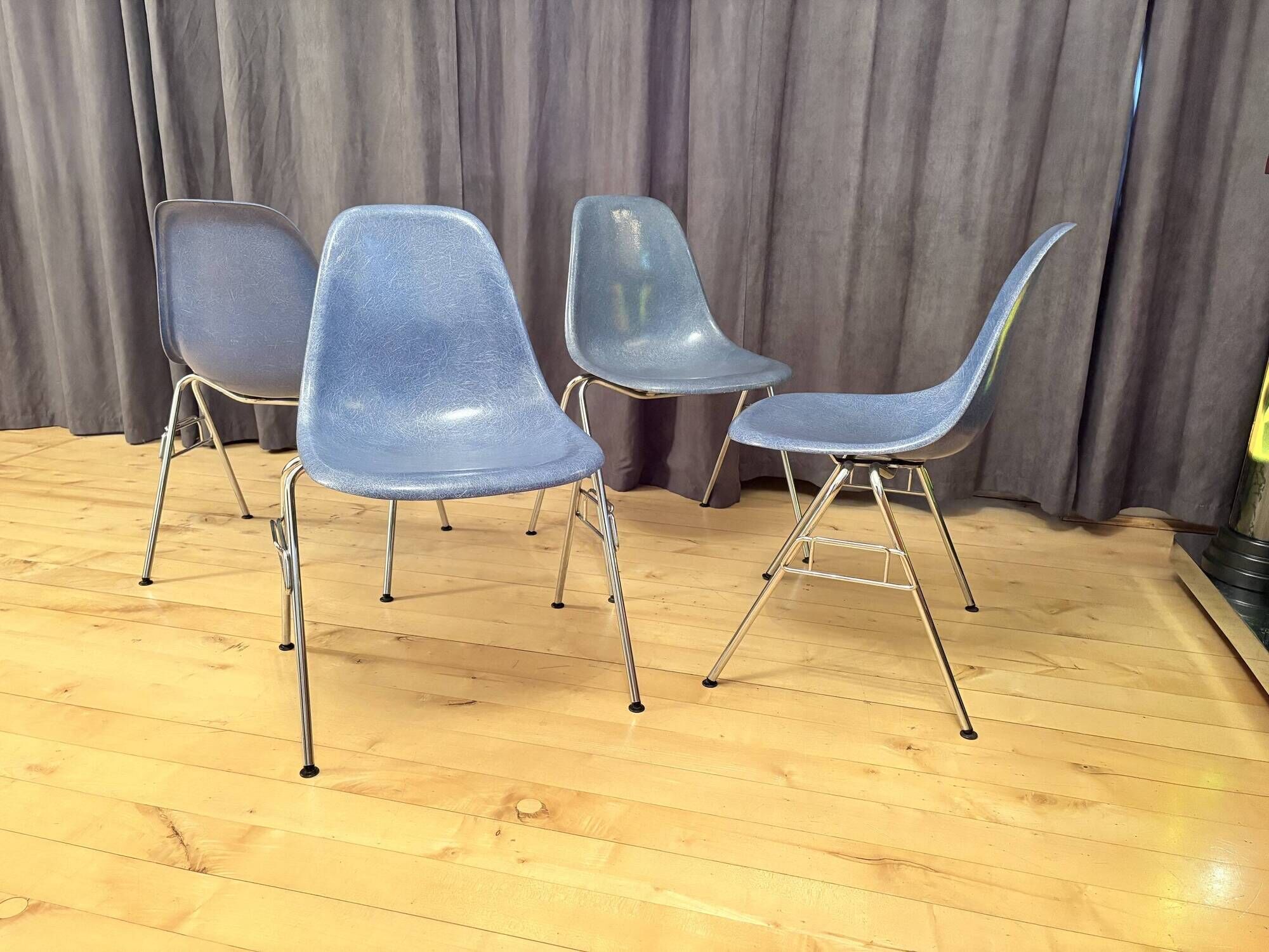 Set of four DSS chairs, fiberglass, designed by Charles and Ray Eames, Herm