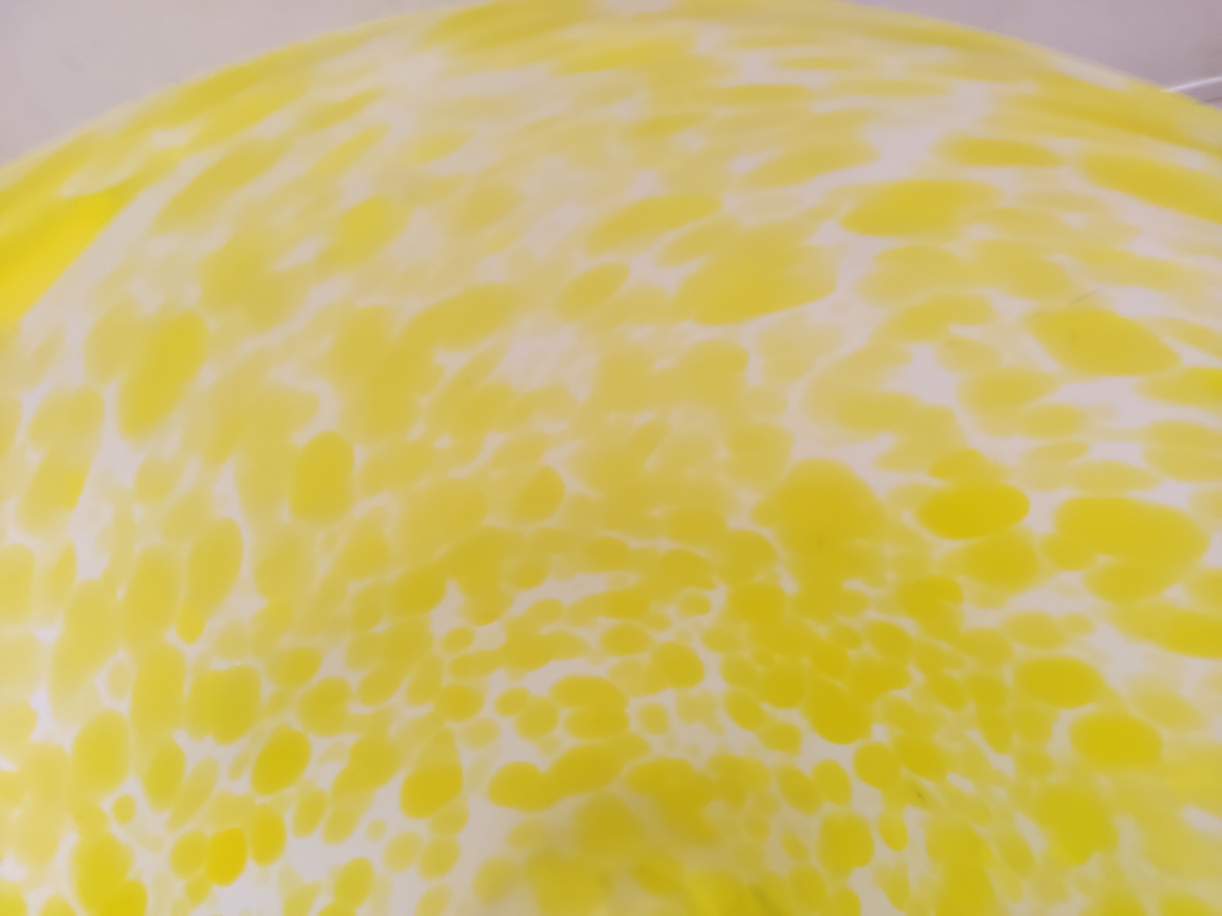 Yellow speckled frosted glass bowl