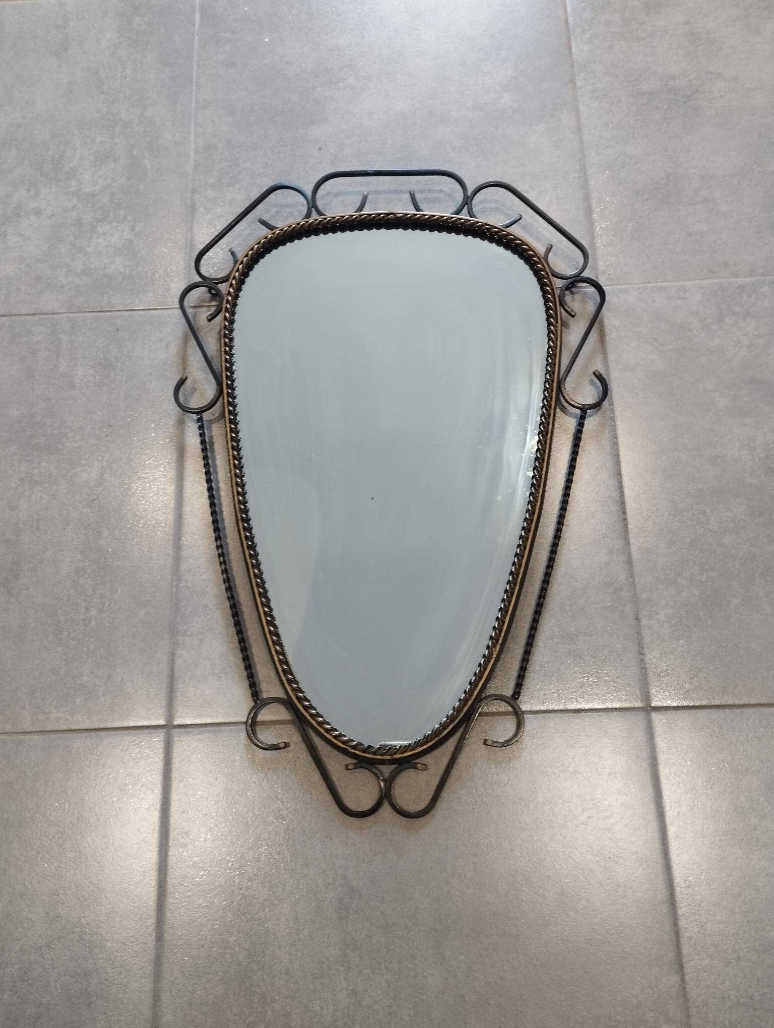Brutalist antique mirror, sixties era.