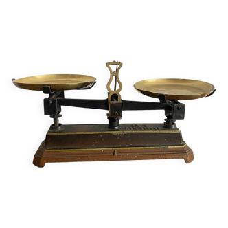 Old scale in cast iron and brass