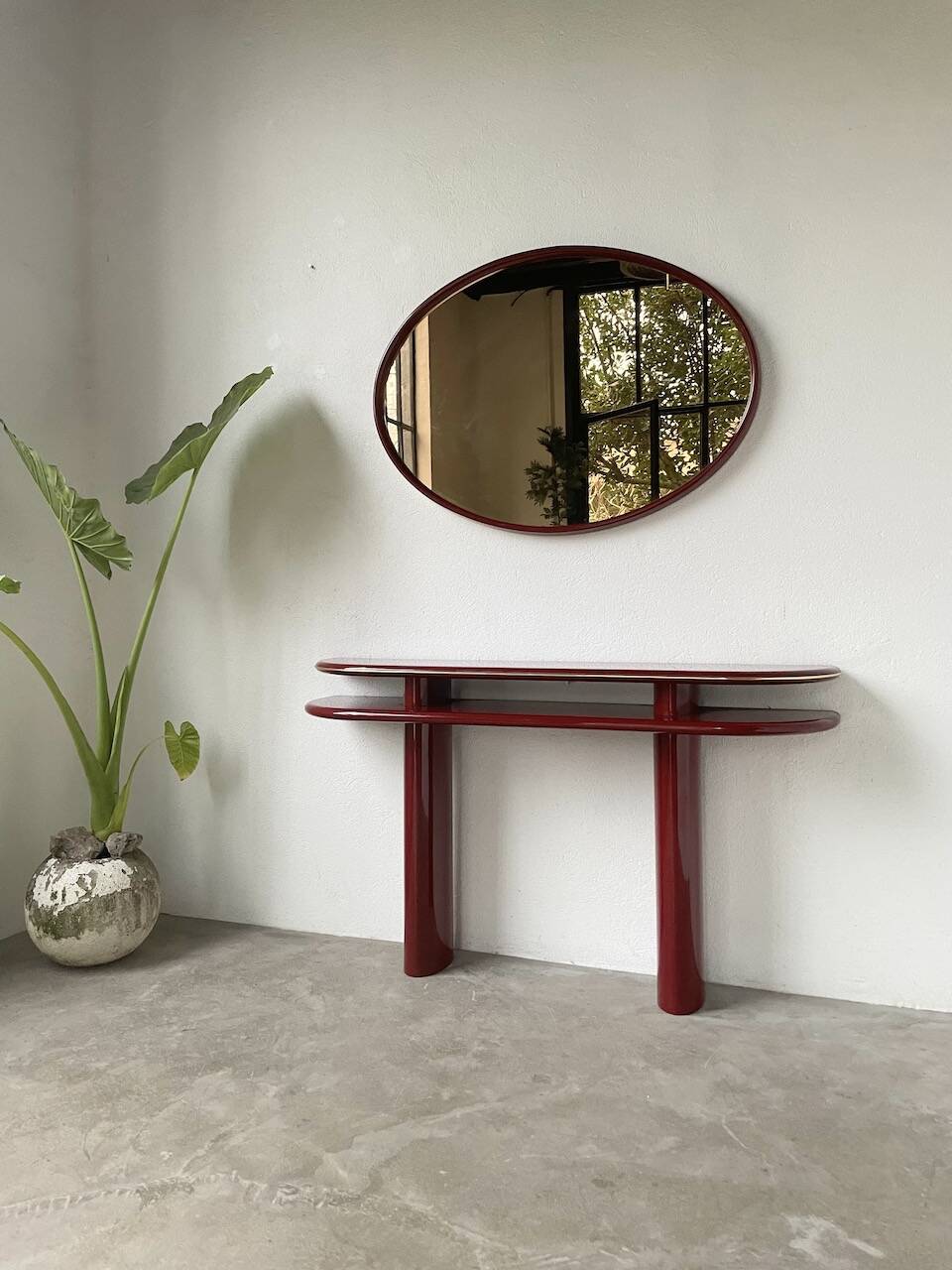 Red lacquered console and its mirror from the 80s