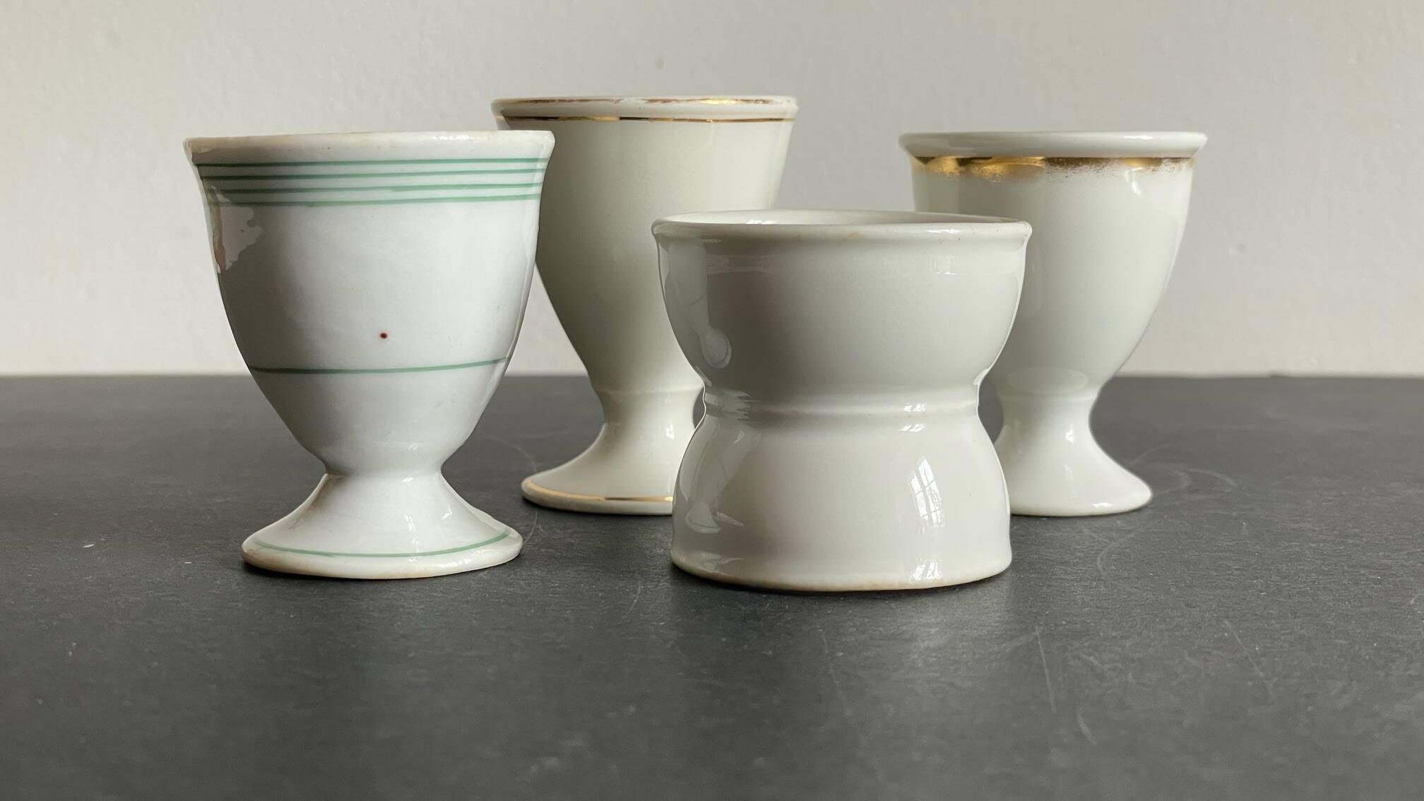 4 antique ceramic egg cups