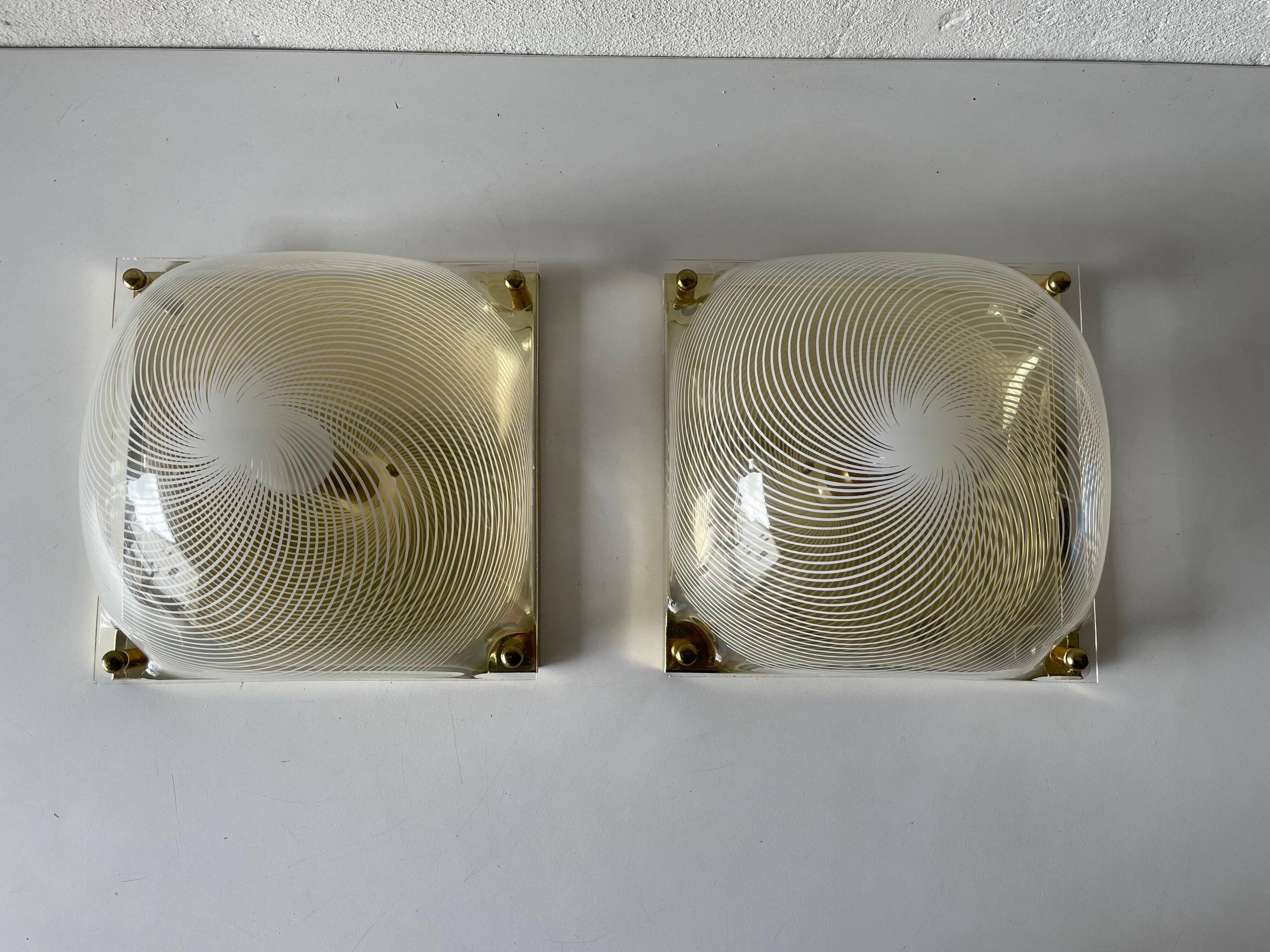 Pair of wall lights or flush mounts in plexiglass by Leola, 1970s, Germany.