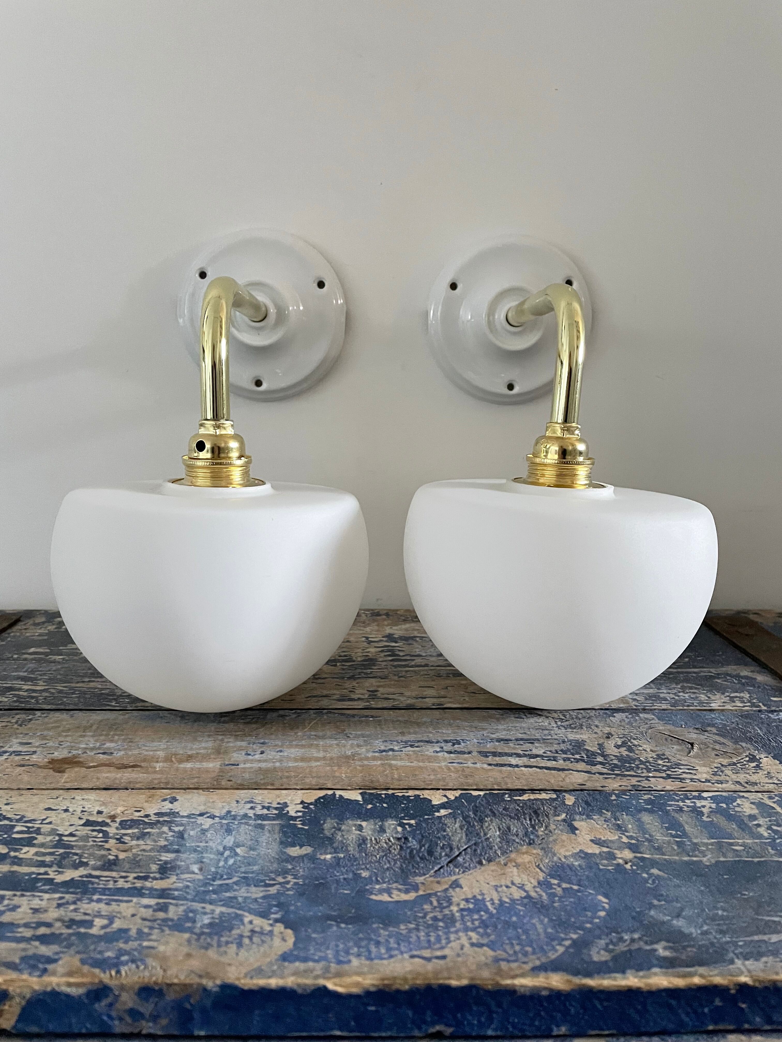 Set of two electrified white opaline wall lamps to nine