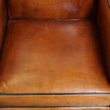Cognac-colored sheepskin Art Deco design armchair in good condition