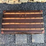 Travel trunk in wood and leather