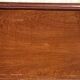 Empire-style bedside table in mahogany