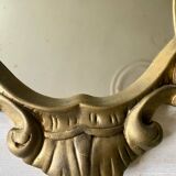 Large golden baroque style mirror