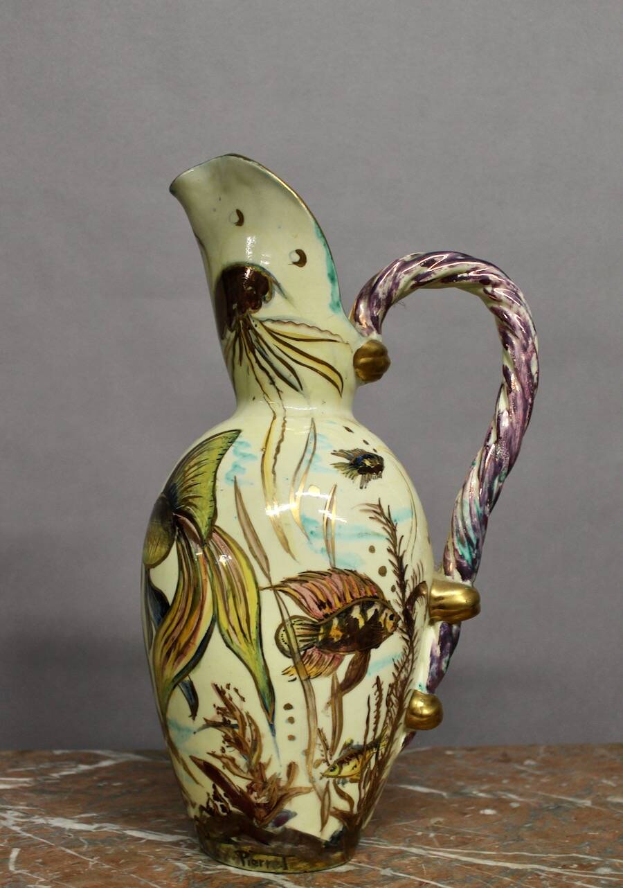 Ceramic jug with fish decoration