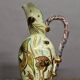 Ceramic jug with fish decoration