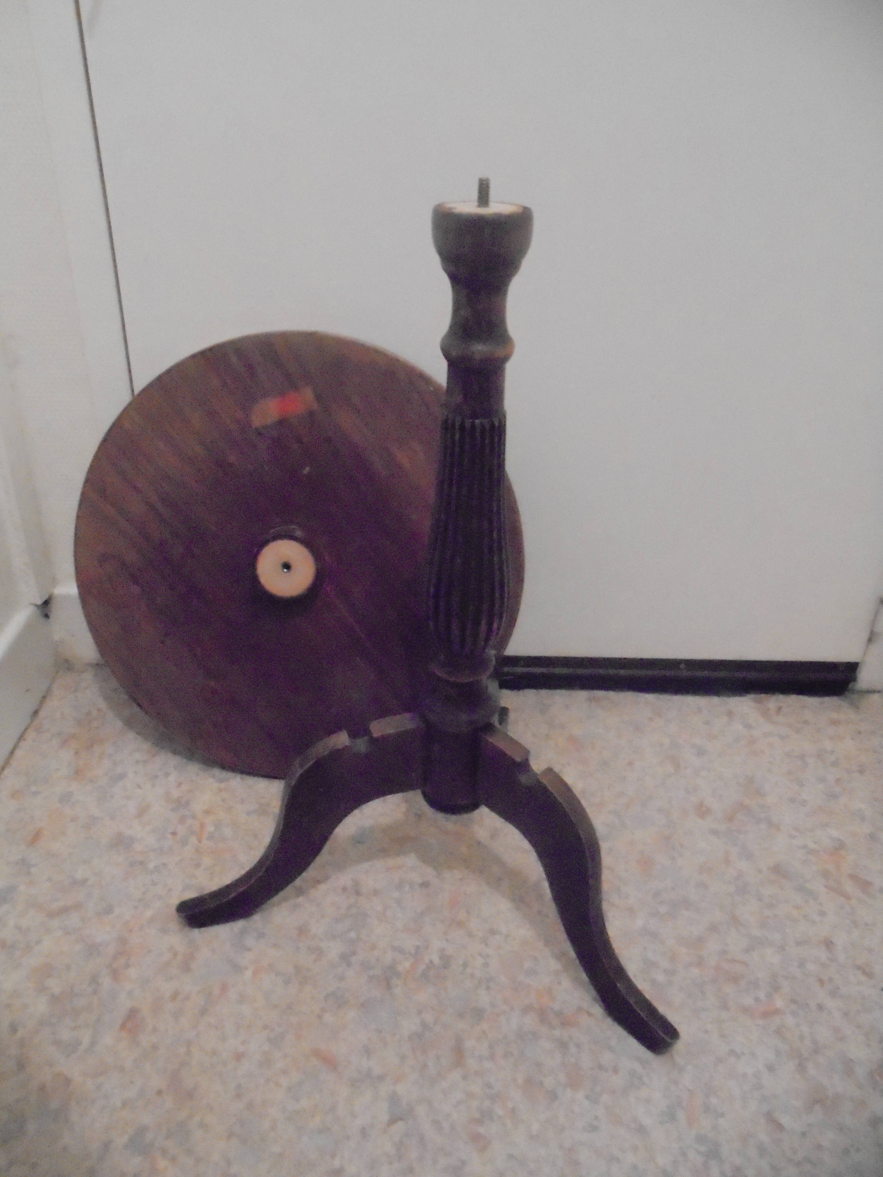 wooden pedestal table