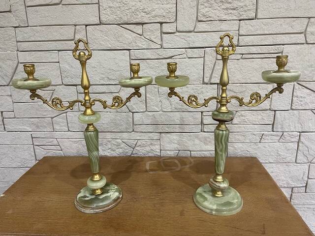 Pair of onyx and brass candlesticks