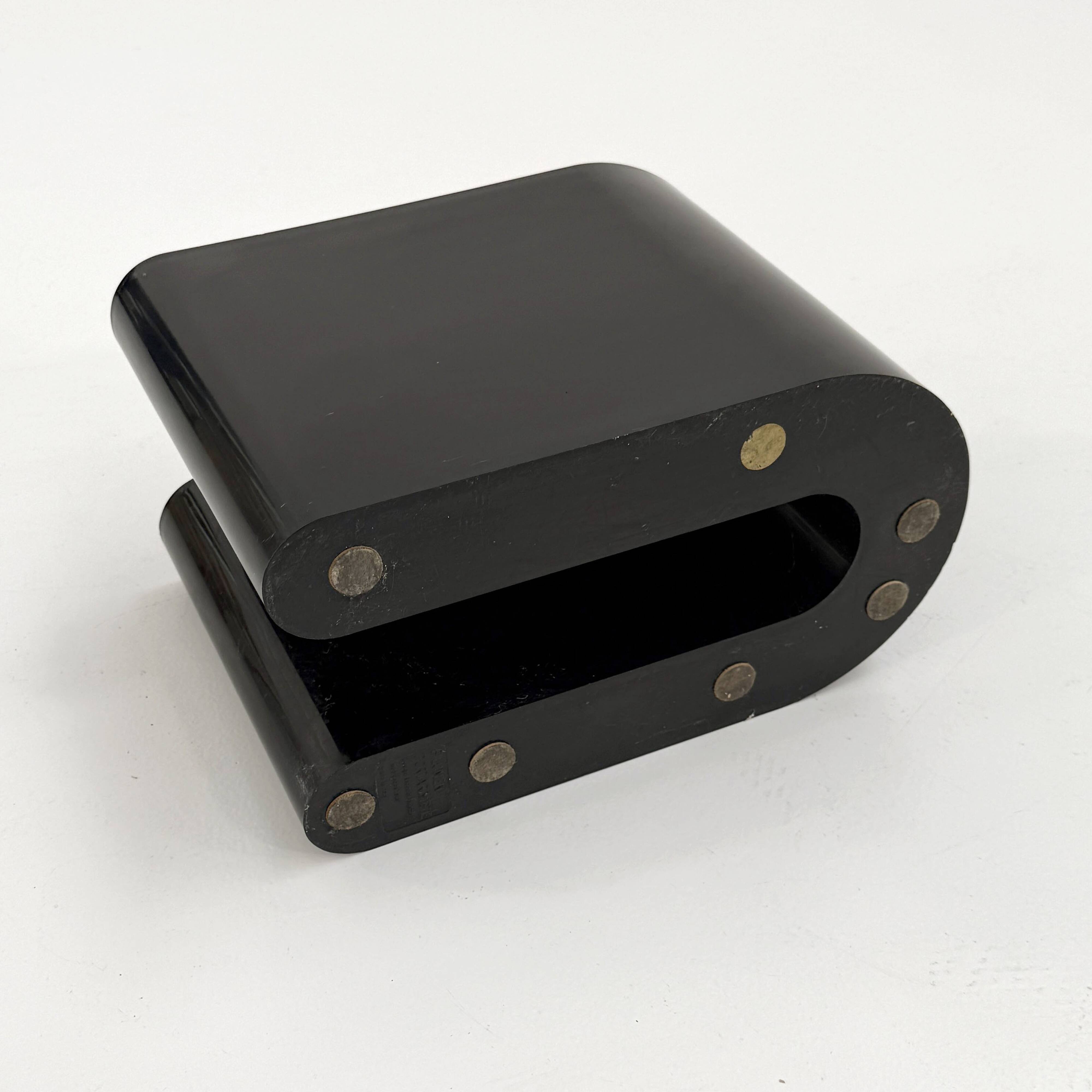 Black magazine rack by Rodolfo Bonetto for Bilumen, 1970