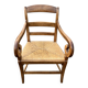 Louis Philippe country armchair in solid wood and straw, hooked armrests