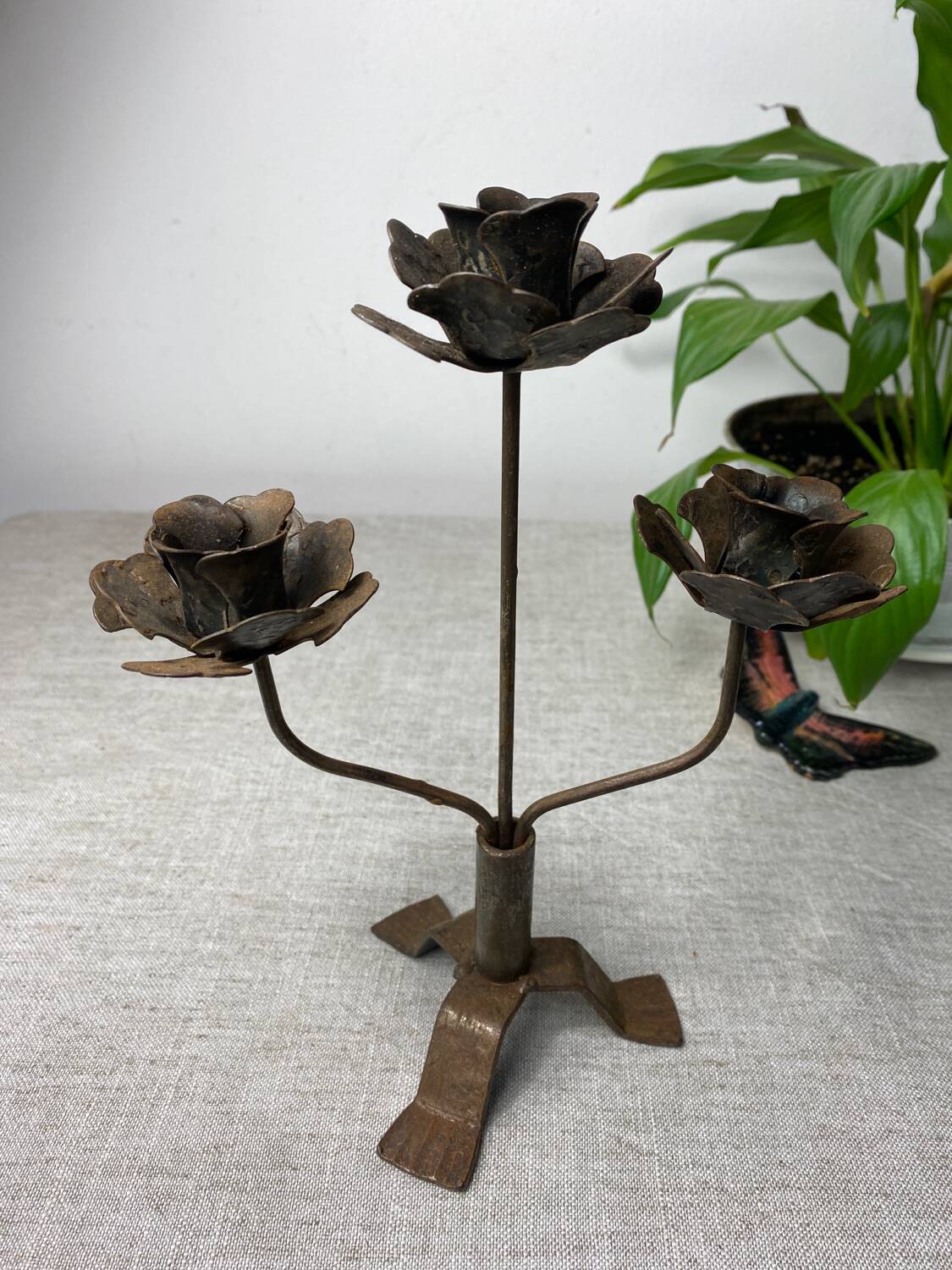 Rose shaped metal candle holder