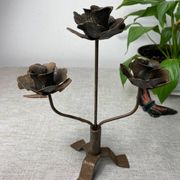 Rose shaped metal candle holder