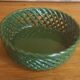 Vintage pocket empty cup in green braided ceramic basket style