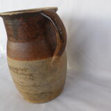 Old stoneware milk jug