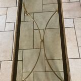 Coffee table in glass and gold metal