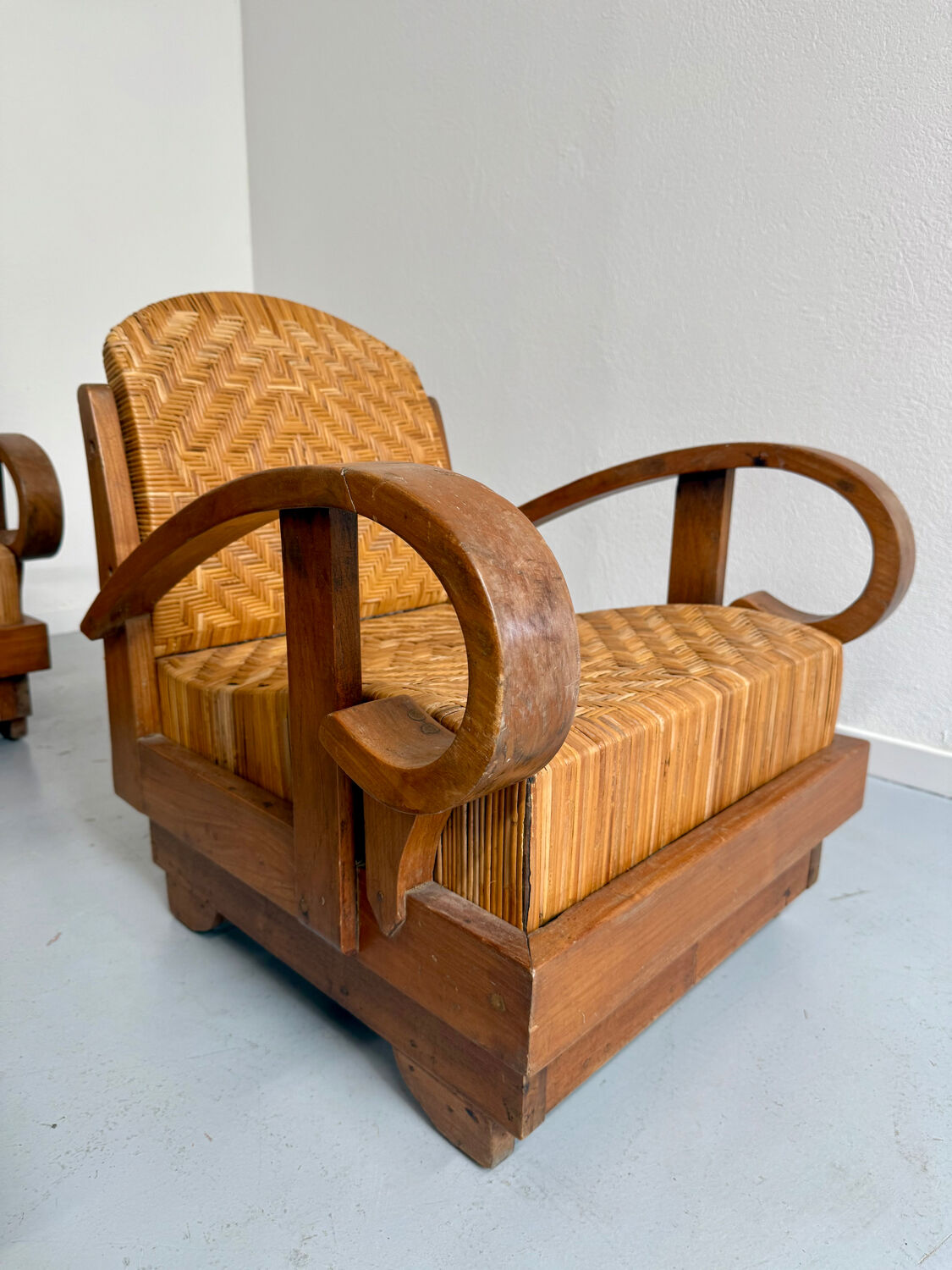 Set of 4 woven rattan armchairs, colonial style, 1950s