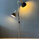 Mid-century black vintage floor lamp with two aluminium spots.