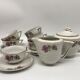 Coffee service 6 cups with saucers, sugar bowl and creamer.