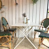 White folding metal bistro table