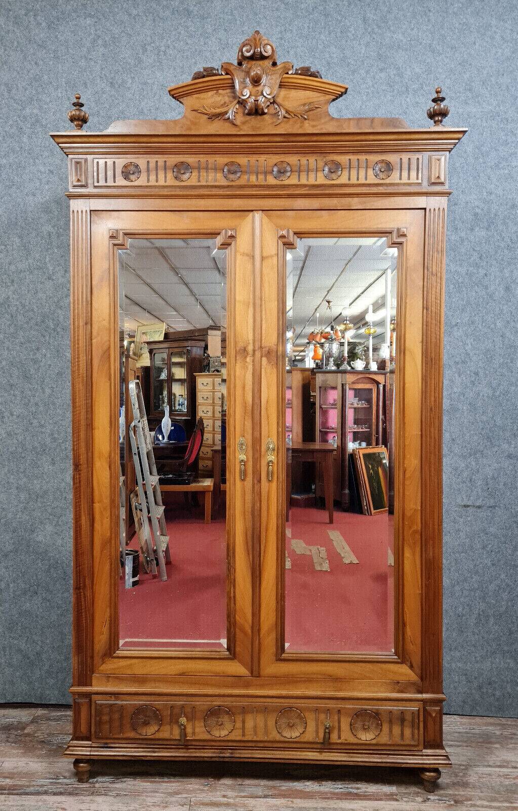 Louis XVI style wardrobe in walnut with blond patina circa 1880