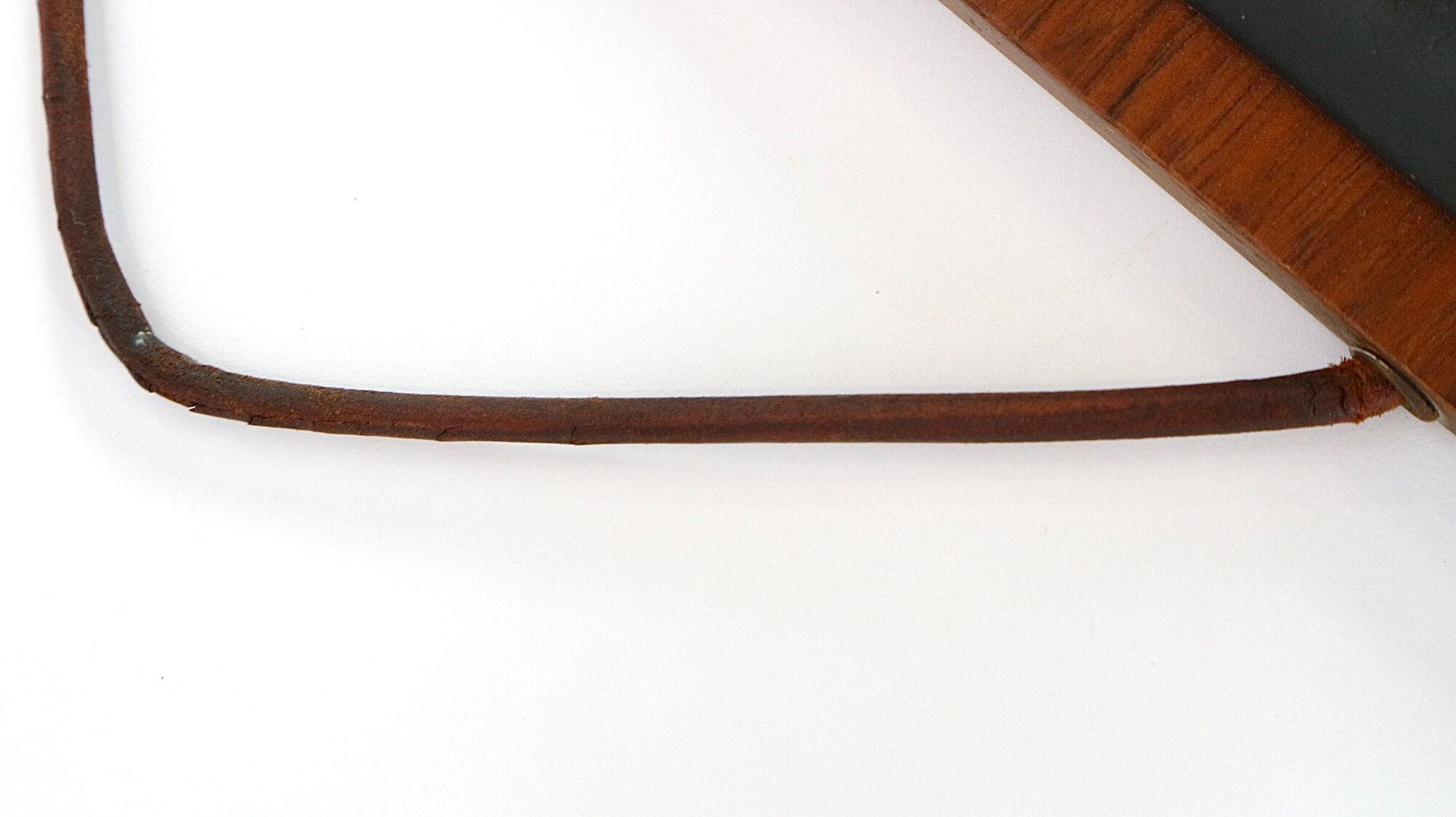 Two coat hangers, wood, leather and black leather, 70s