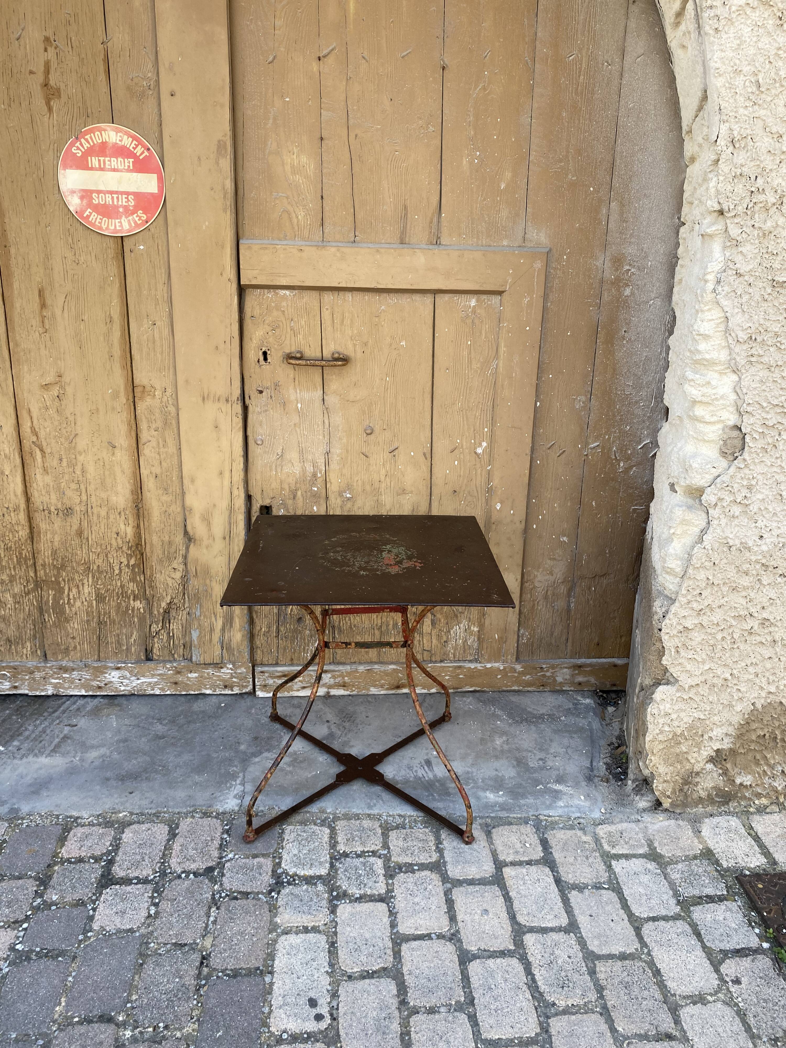 Wrought iron pedestal table