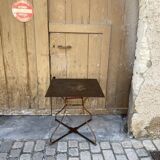 Wrought iron pedestal table