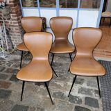 4 vintage chairs in skaï and metal base from the 60s