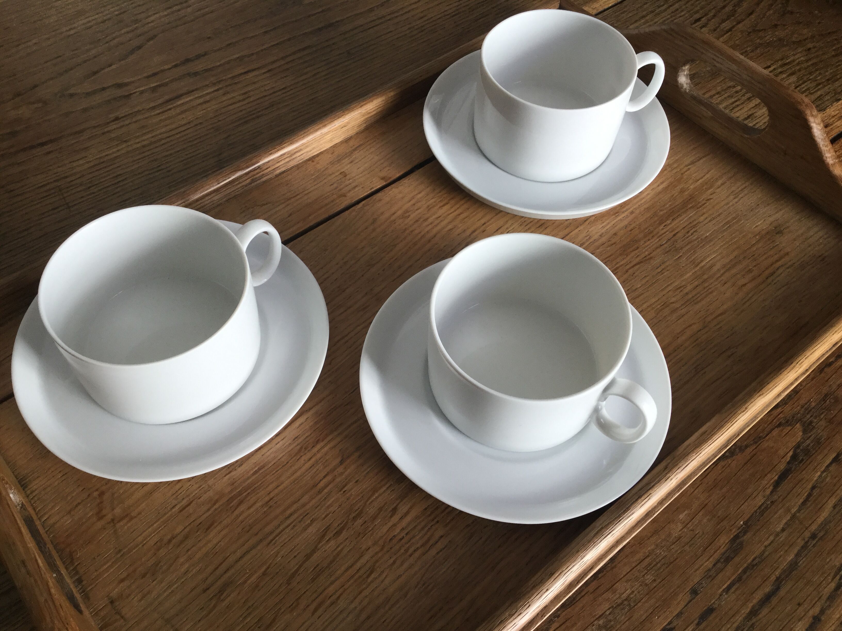 Tea cups and under white porcelain cups