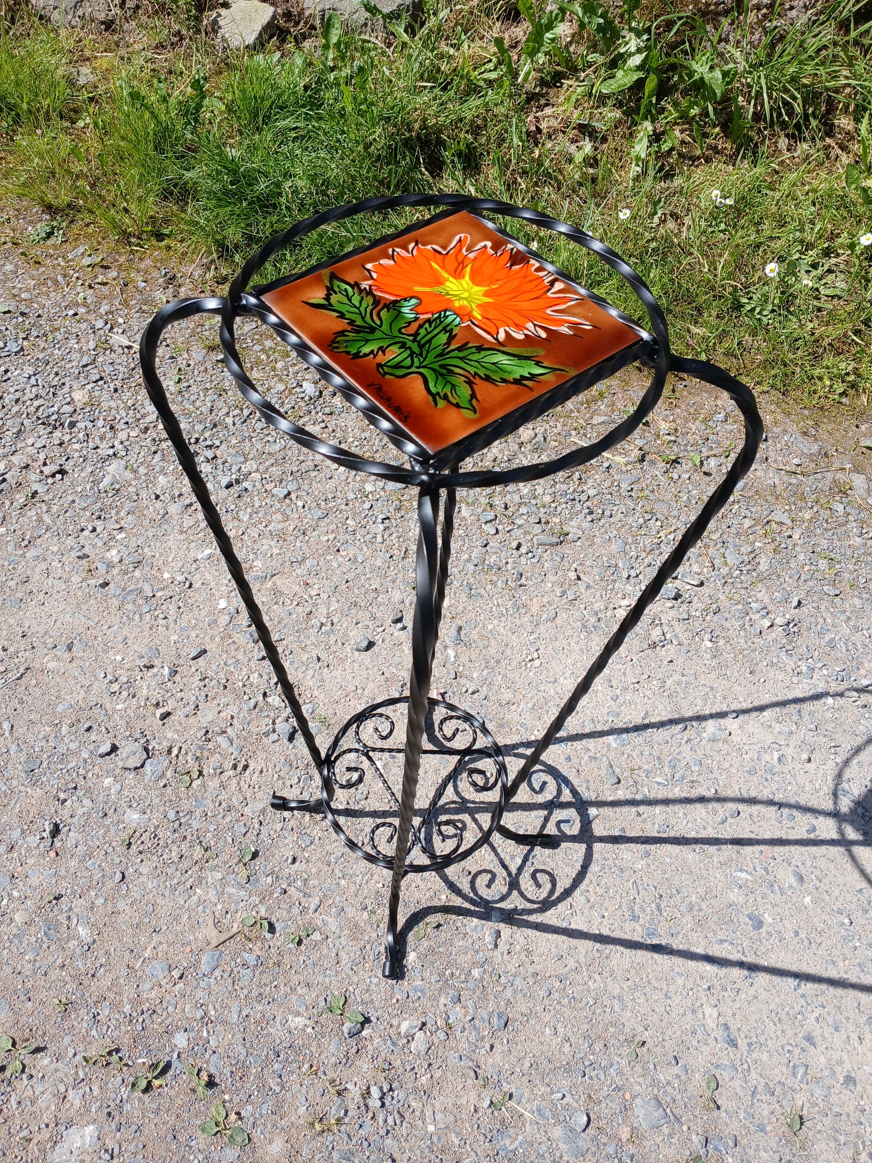 Vintage plant stand with Vallauris pottery.