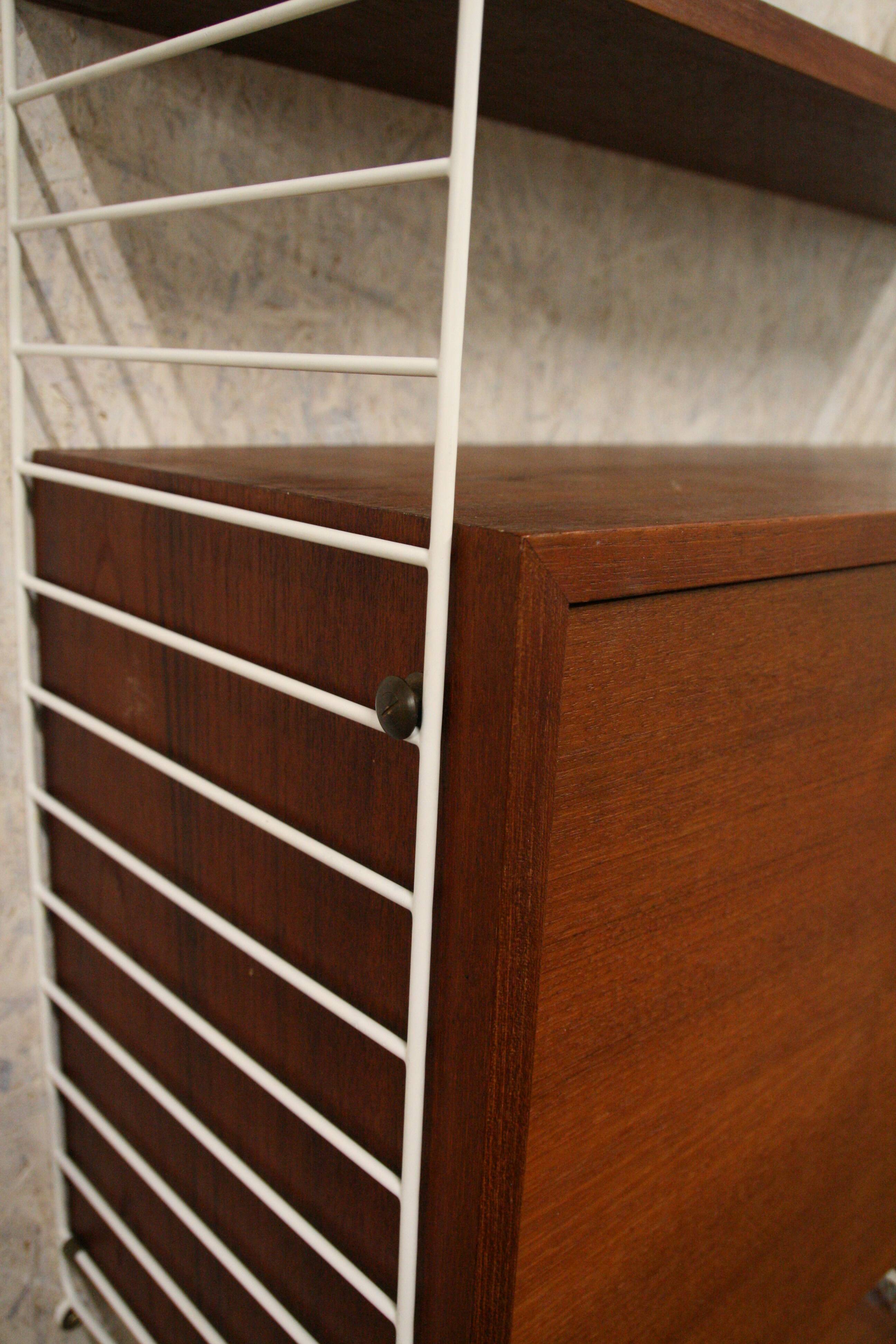Vintage wall unit/shelving by Nisse Strinning