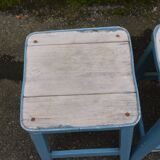 Three blue wooden stools