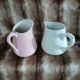 2 antique milk jugs