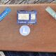 Brown vintage suitcase with CHENEY England brand travel tags
