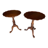 A pair of reclining side tables.