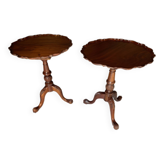 A pair of reclining side tables.