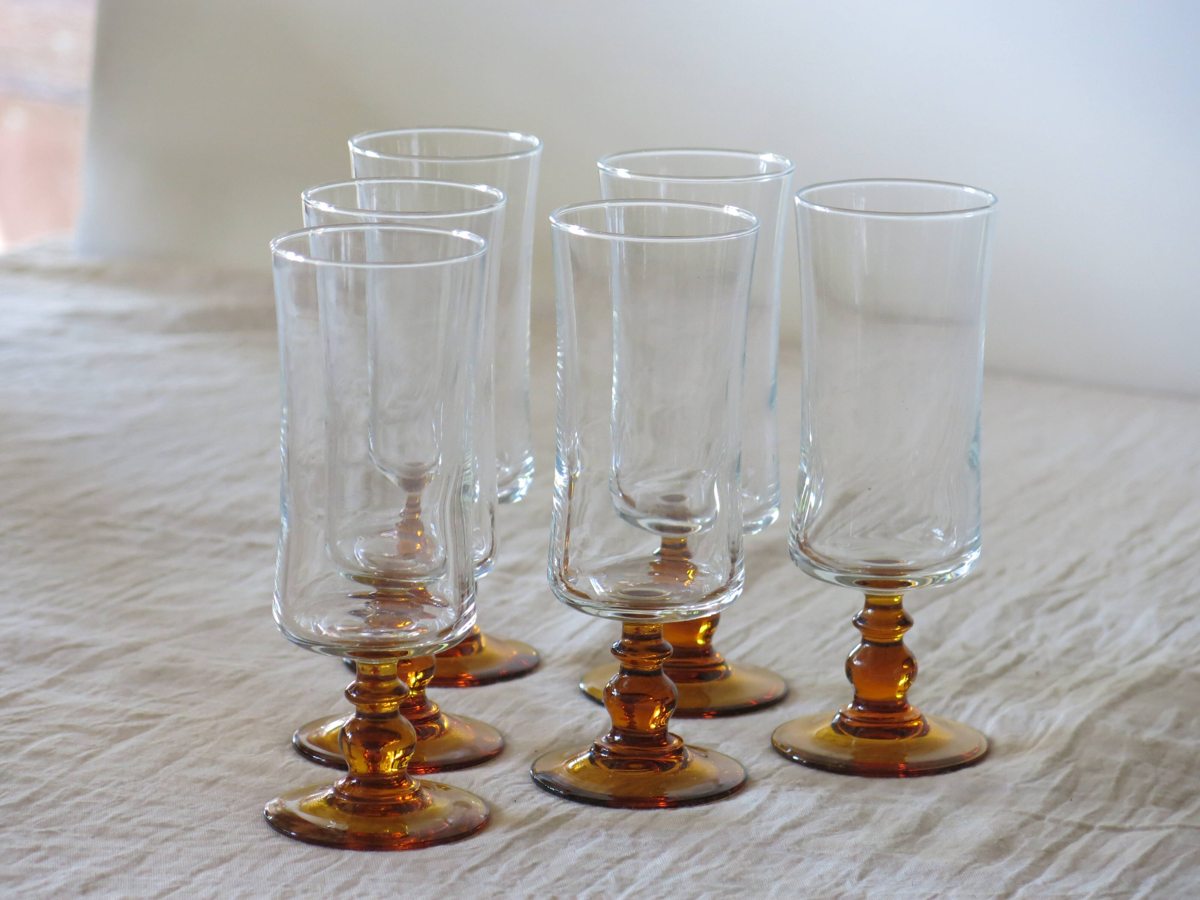6 vintage brown footed champagne flutes in very good condition